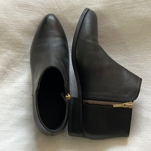 Nisolo waterproof black ankle boots.